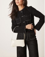 textured curved based shoulder bag in stone
