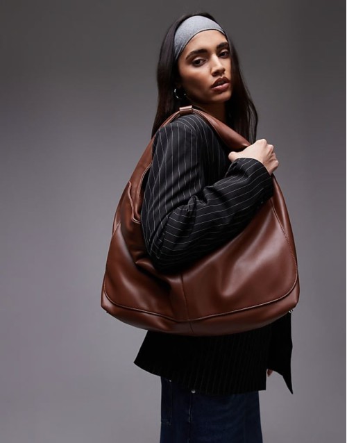 the big sling faux leather bag in brown