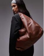 the big sling faux leather bag in brown